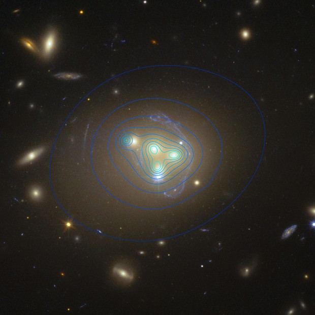 Hubble image of galaxy cluster Abell 3827 showing dark matter distribution 